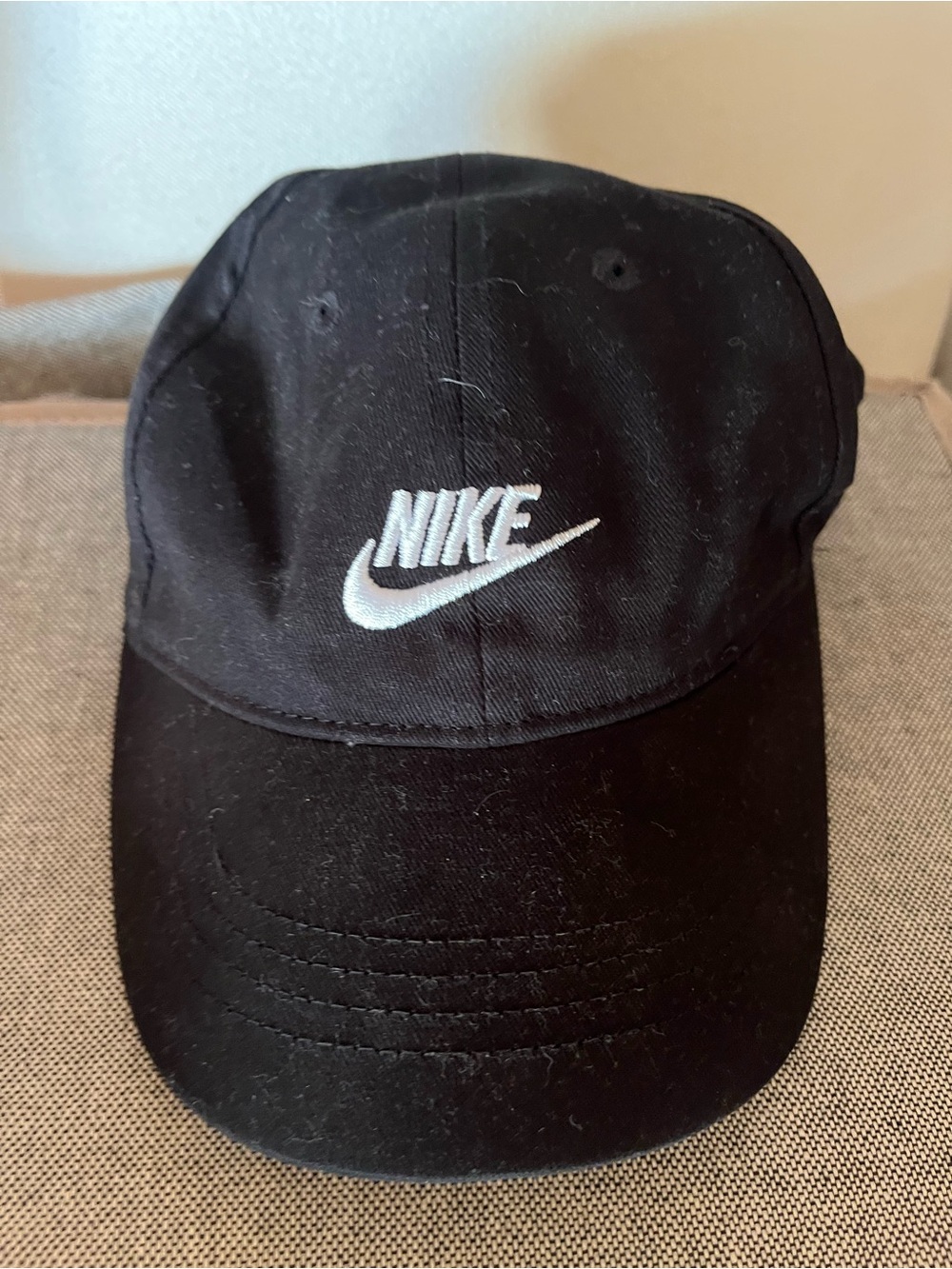 Nike Black Cap with White Swoosh Logo